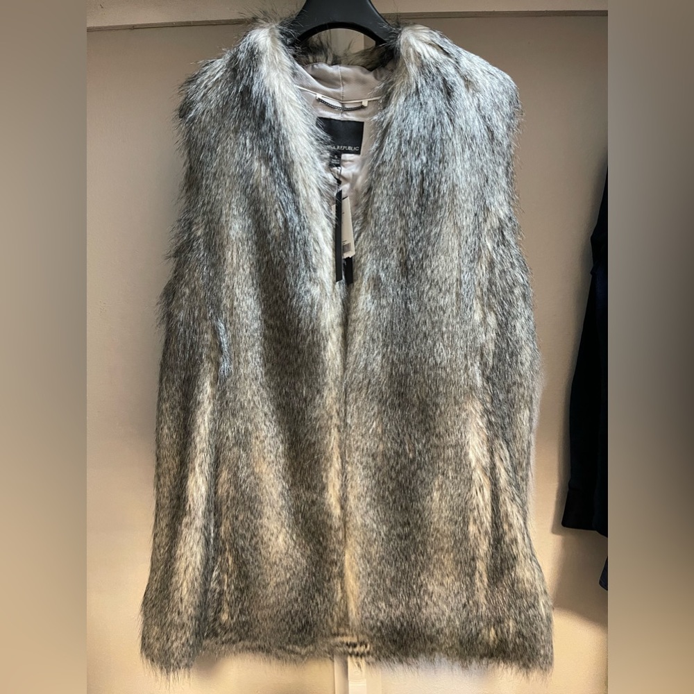 Brand new, Banana Republic faux fur vest, with pockets, very soft and classy.